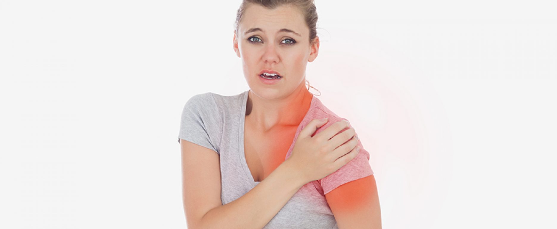 Kvinne med vond skulder